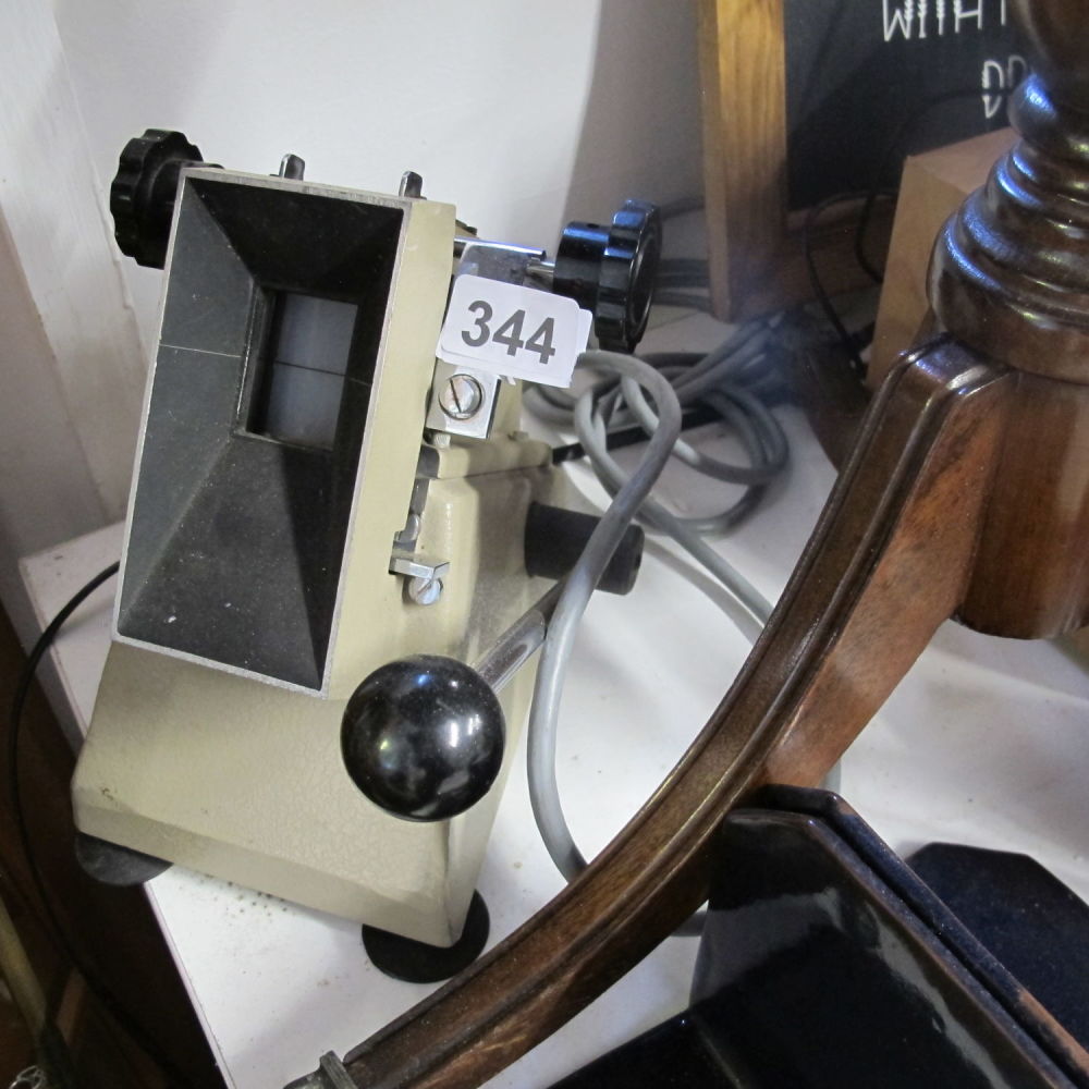 Lot 344: a photographic negative trimming machine/lamp upcycling opportunity