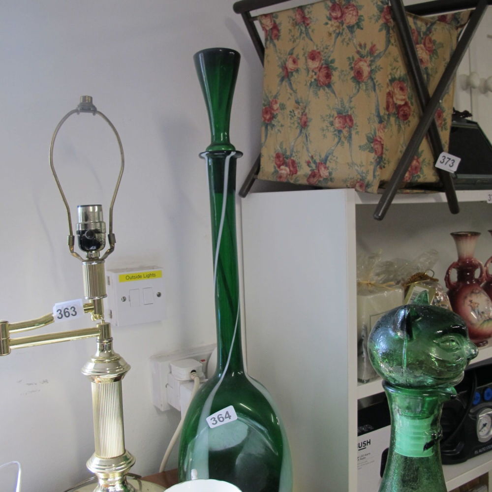 Lot 364: a hand blown green and white swirl blown...