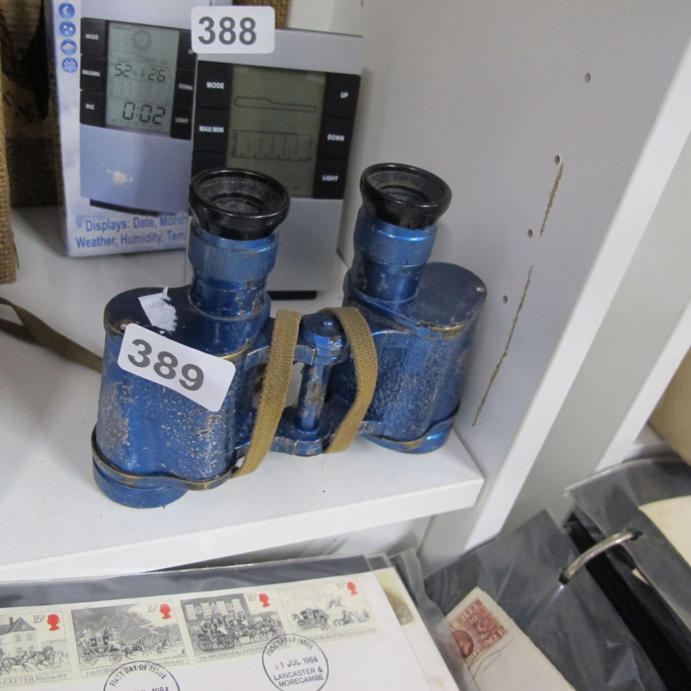 Lot 389: Vintage set of 8x30 binoculars