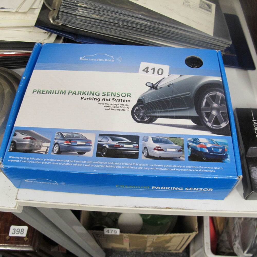 Lot 410: boxed new parking sensor kit for her indoors