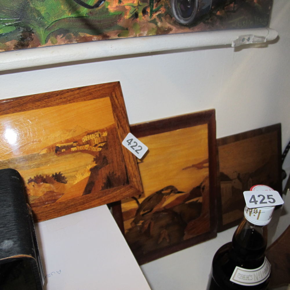 Lot 422: three carved wooden pictures
