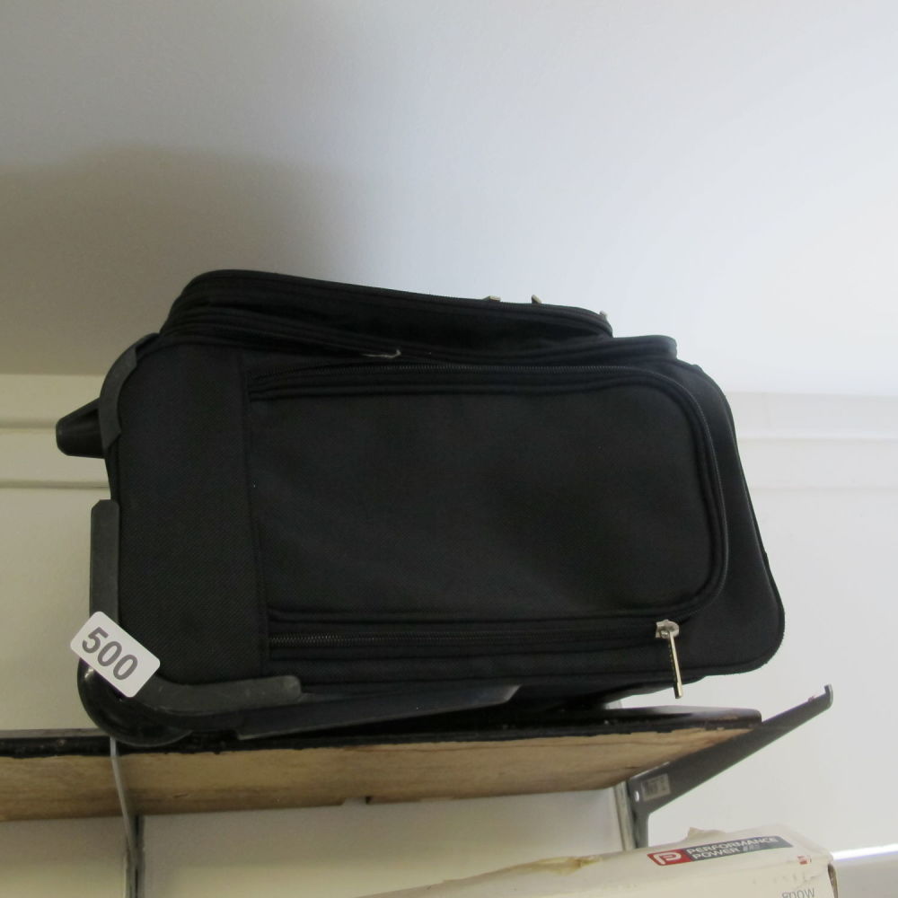 Lot 500: pull along holdall for backy smuggling