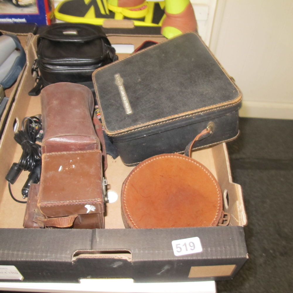 Lot 519: a box of vintage leather camera cases 