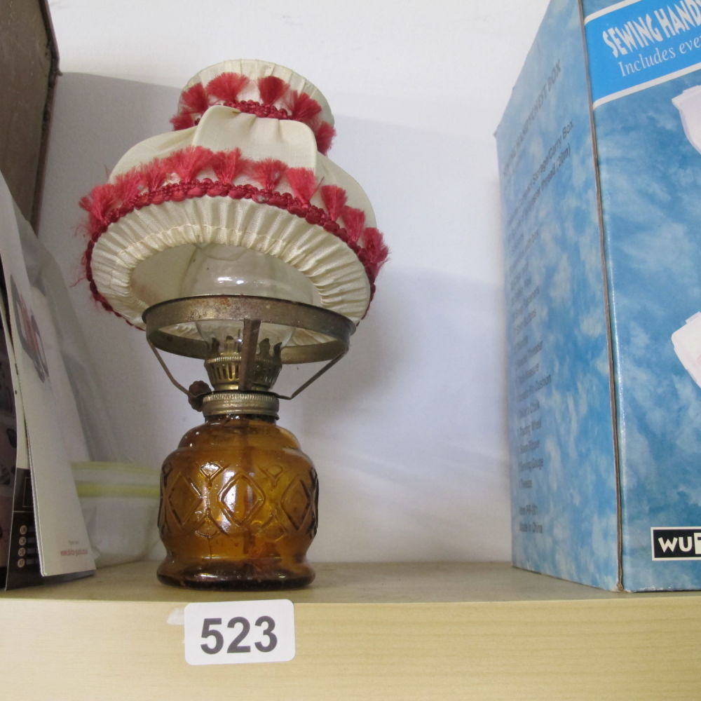 Lot 523: a vintage oil lamp