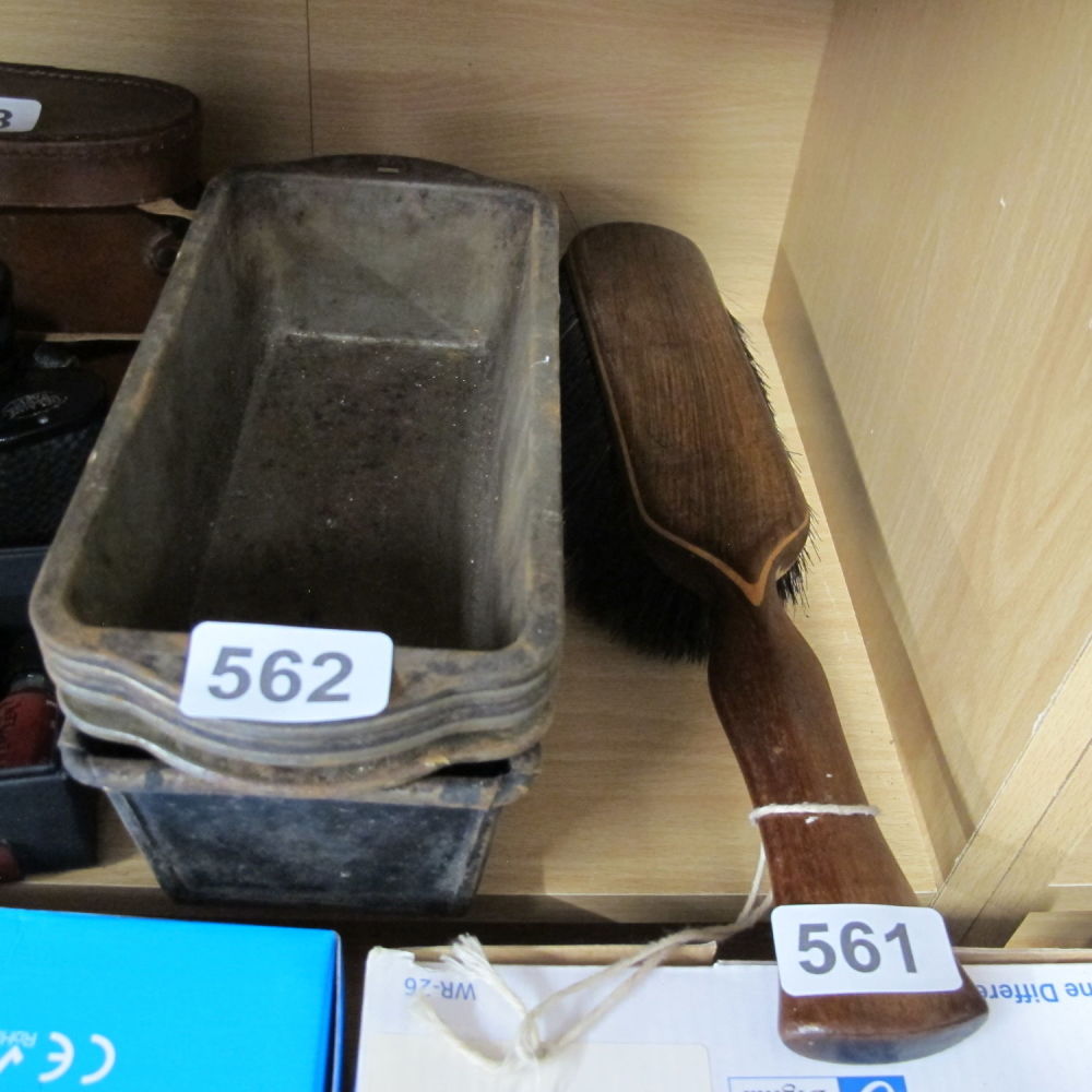Lot 562: metal branded bread tins