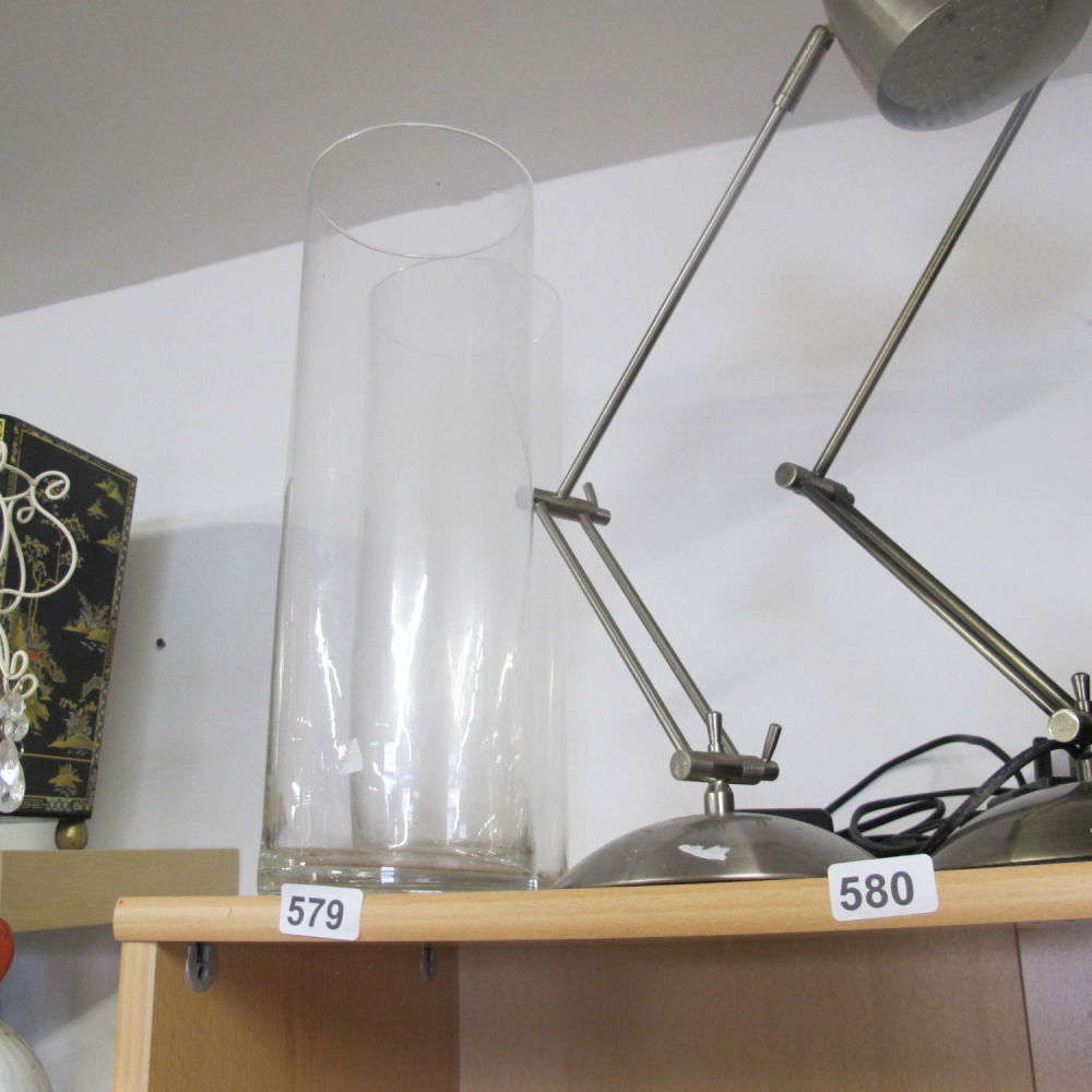 Lot 579: Two tall glass vases