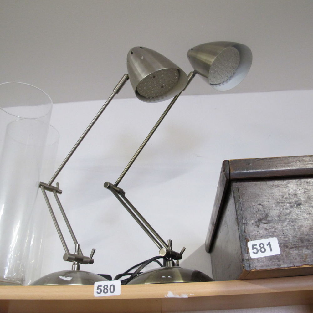 Lot 580: Two angle poised led desk lamps