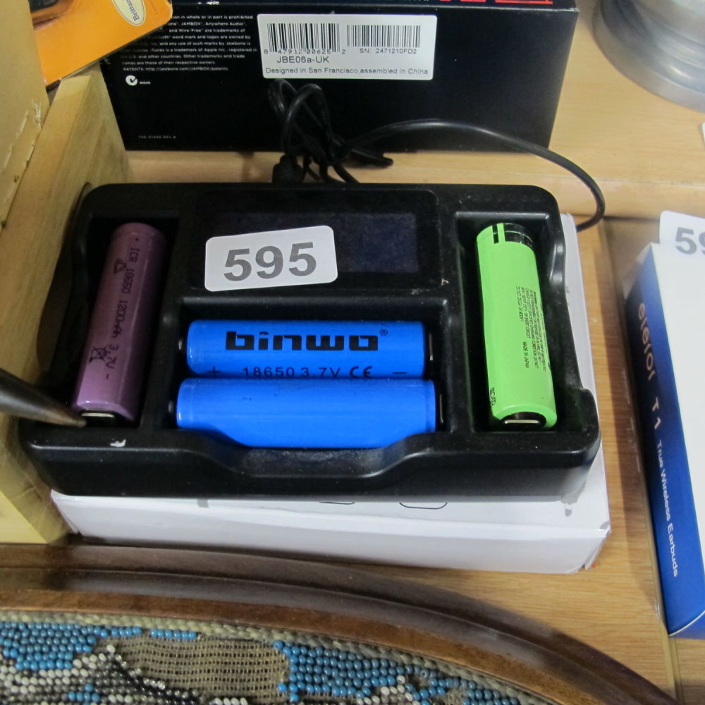 Lot 595: LCD universal intelligent battery charger with LCD screen