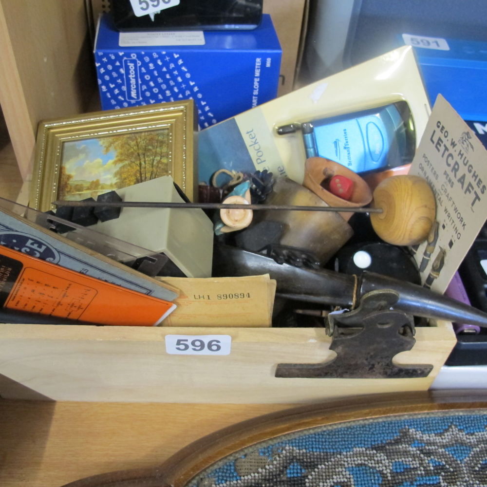 Lot 596: A man draw of interesting items