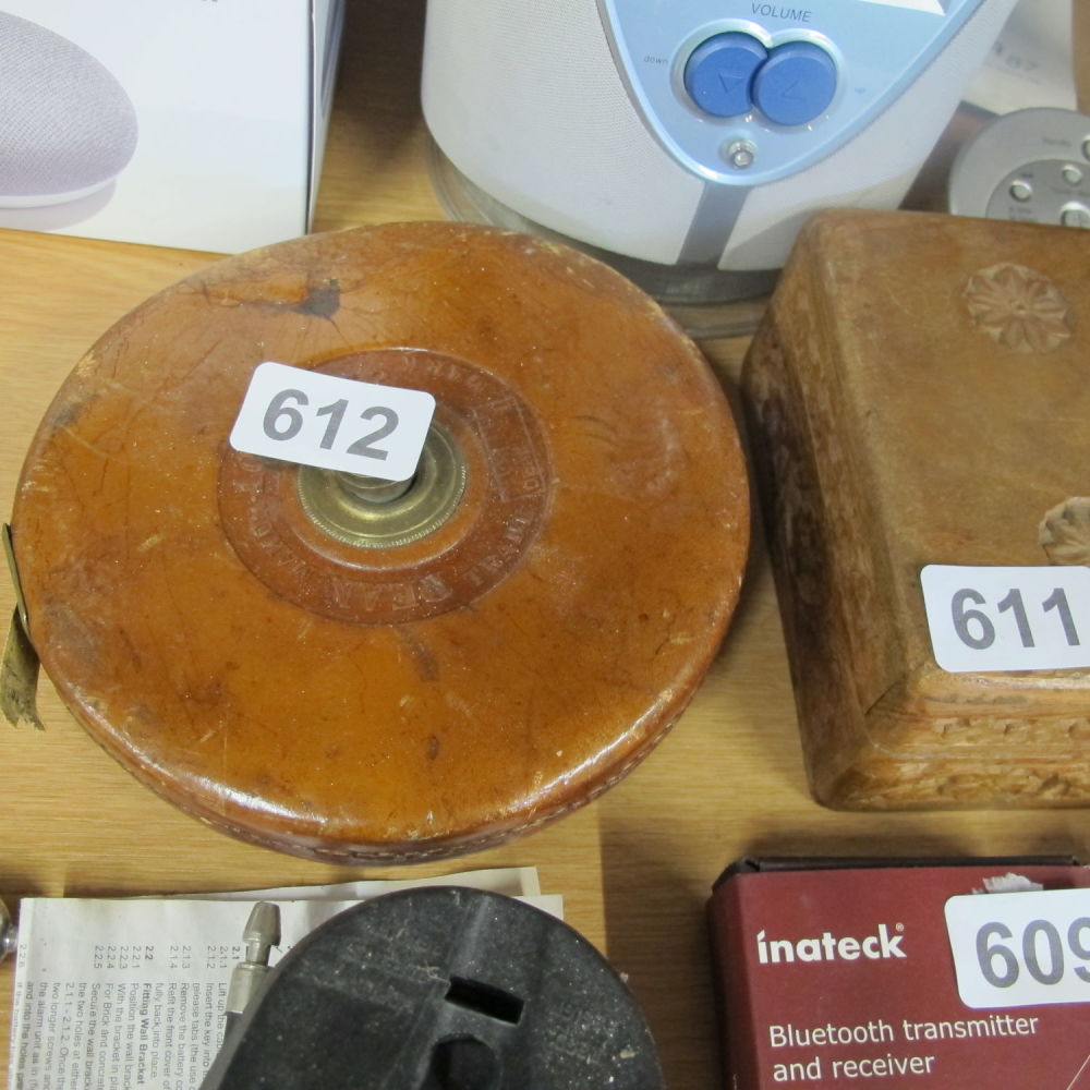 Lot 612: A vintage carpenters leather bound tape measure