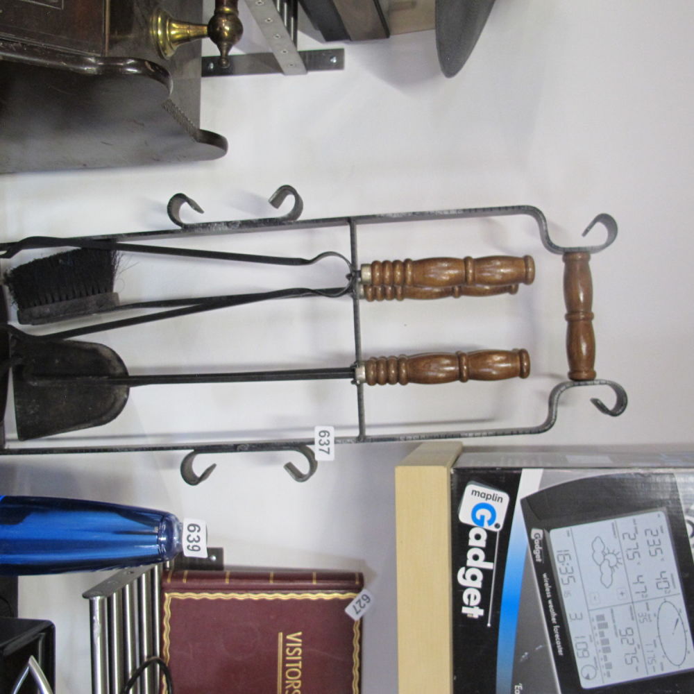 Lot 637: Large fire side companion set