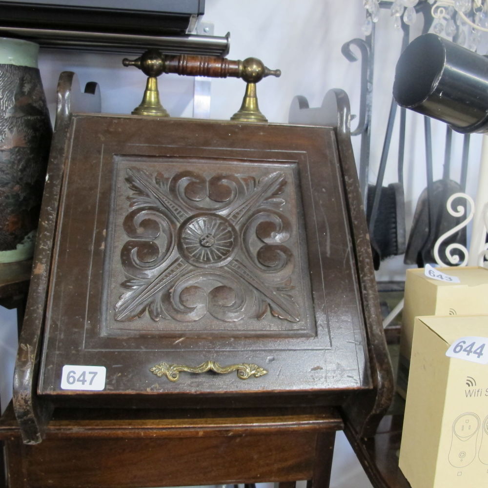Lot 647: Antique wooden coal box ornately carved