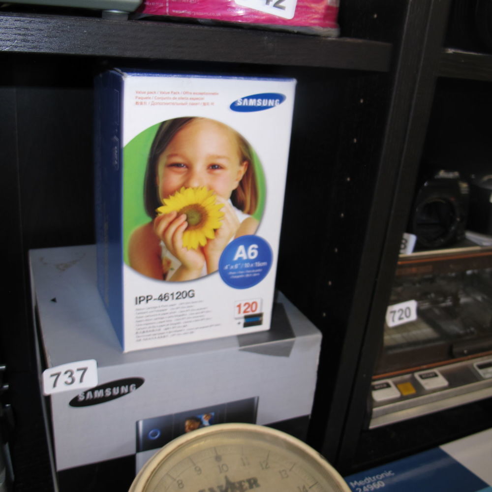 Lot 737: Samsung camera photo printer plus 120 sheets of...