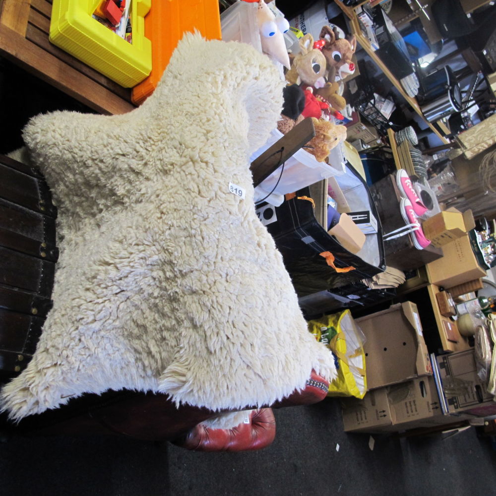 Lot 819: lamb skin rug