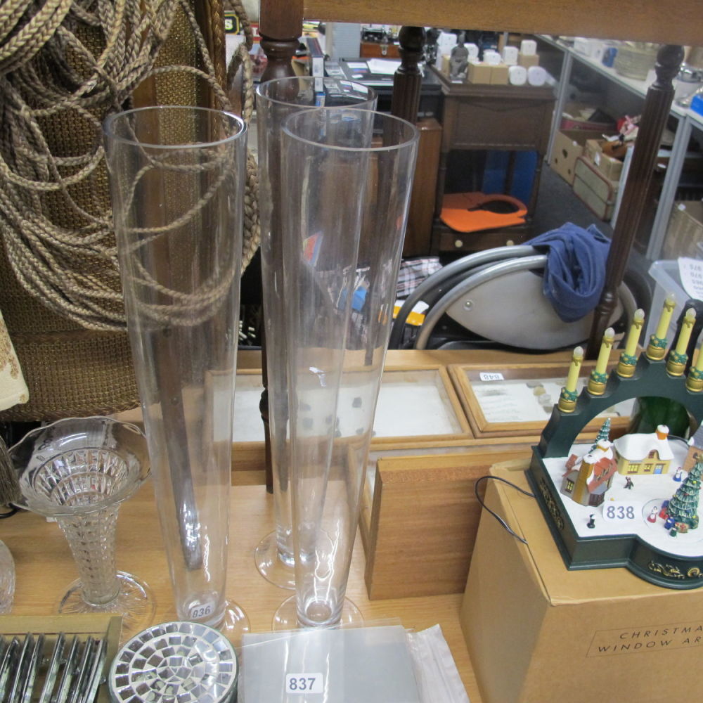 Lot 836: Three tall glass vases 