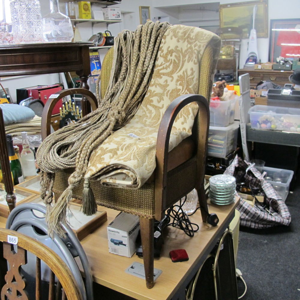 Lot 854: Lloyd loom style chair / commode