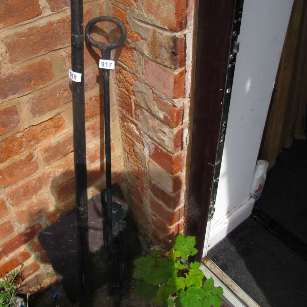 Lot 917: vintage wrought metal foot controlled sliding gate/barn door...