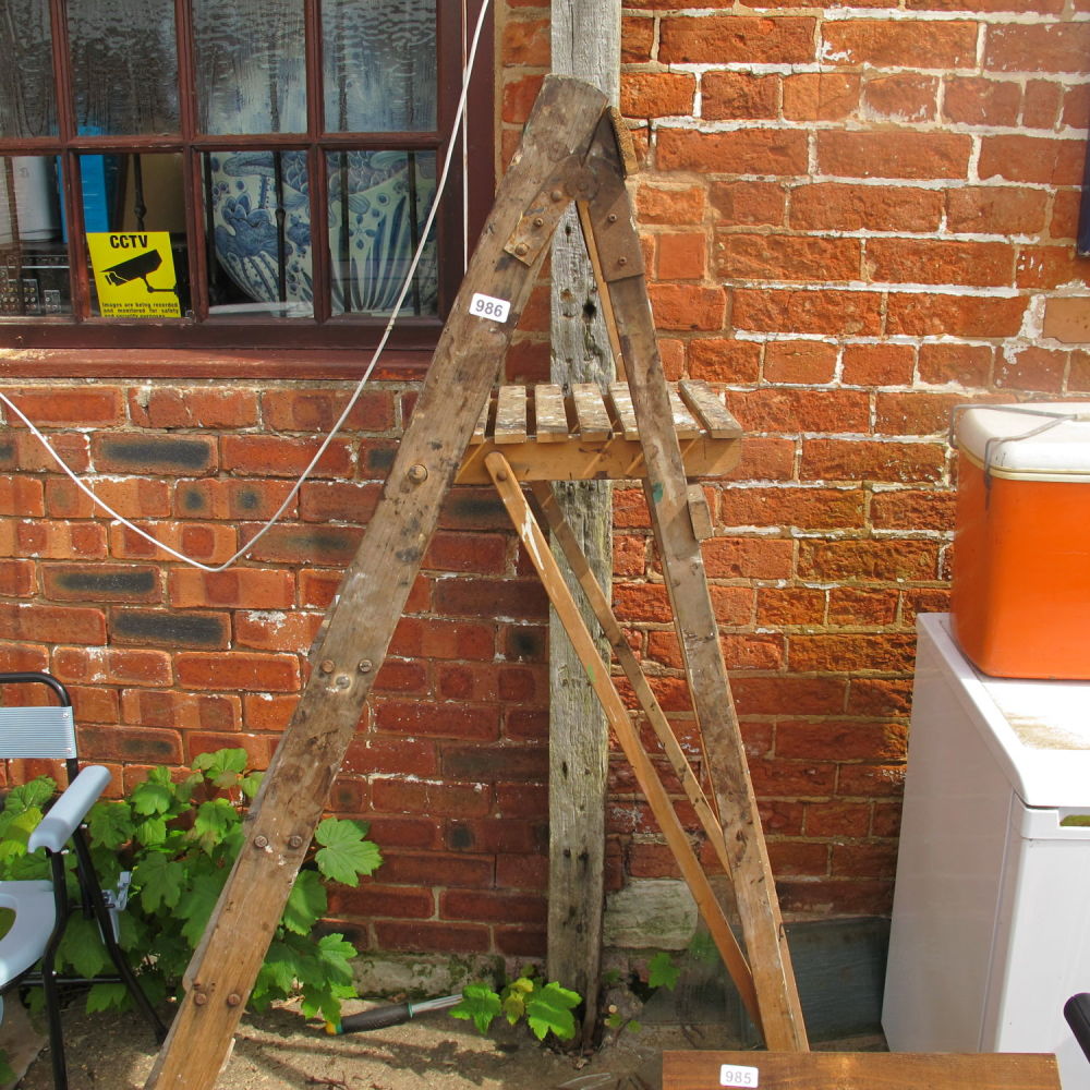 Lot 986: wooden step ladders
