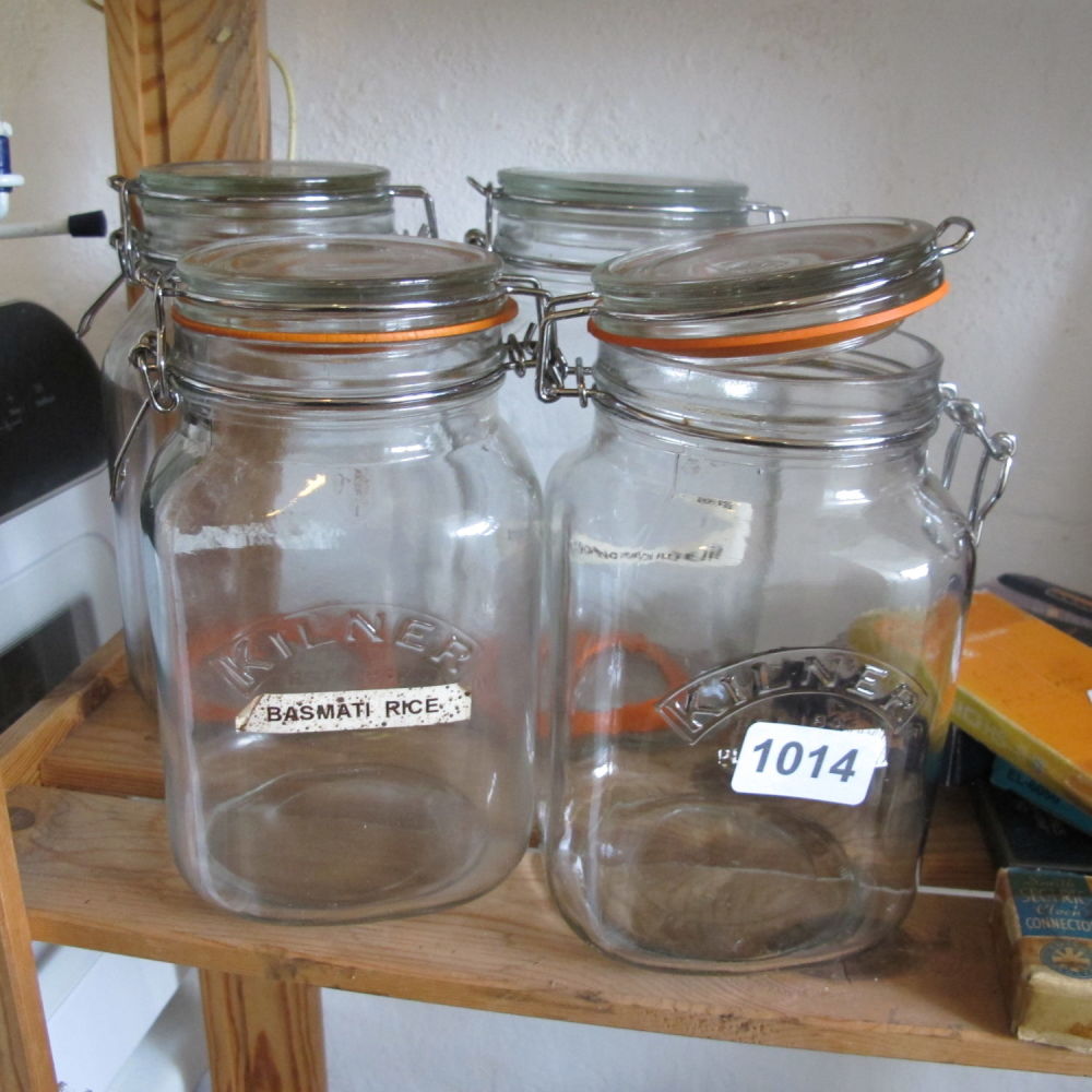 Lot 1014: Four glass Kilner storage jars 