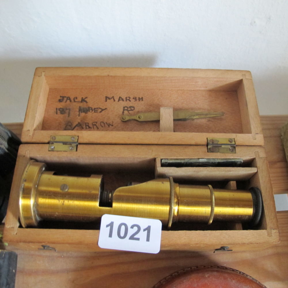 Lot 1021: French field brass microscope in wooden case 