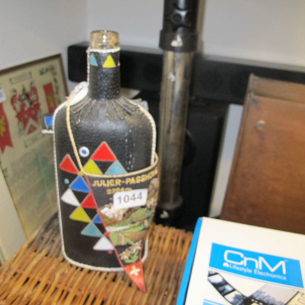 Lot 1044: Leather bound bottle