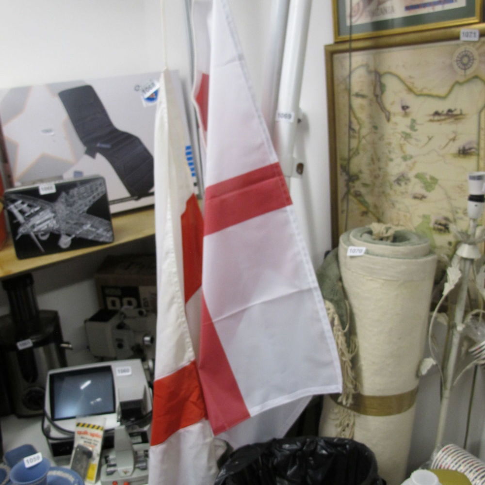 Lot 1068: two England flags /one cotton original and one...