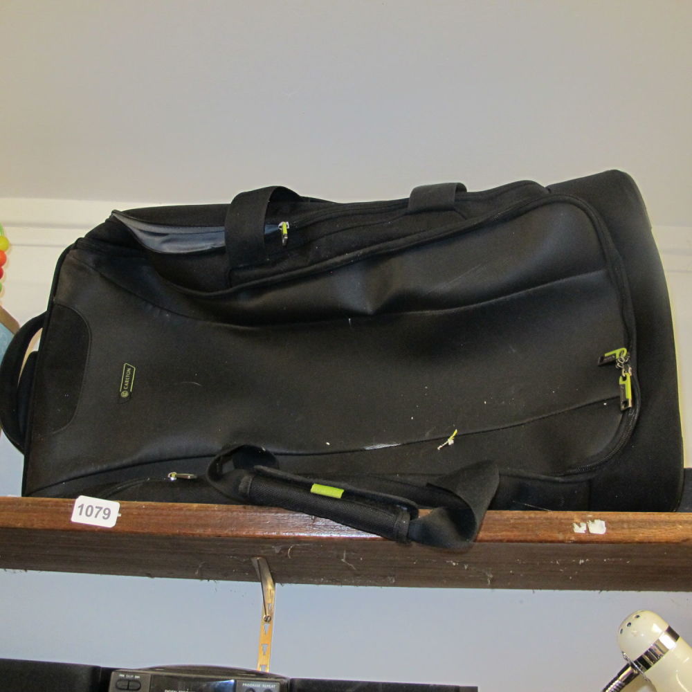 Lot 1079: Leather bag 