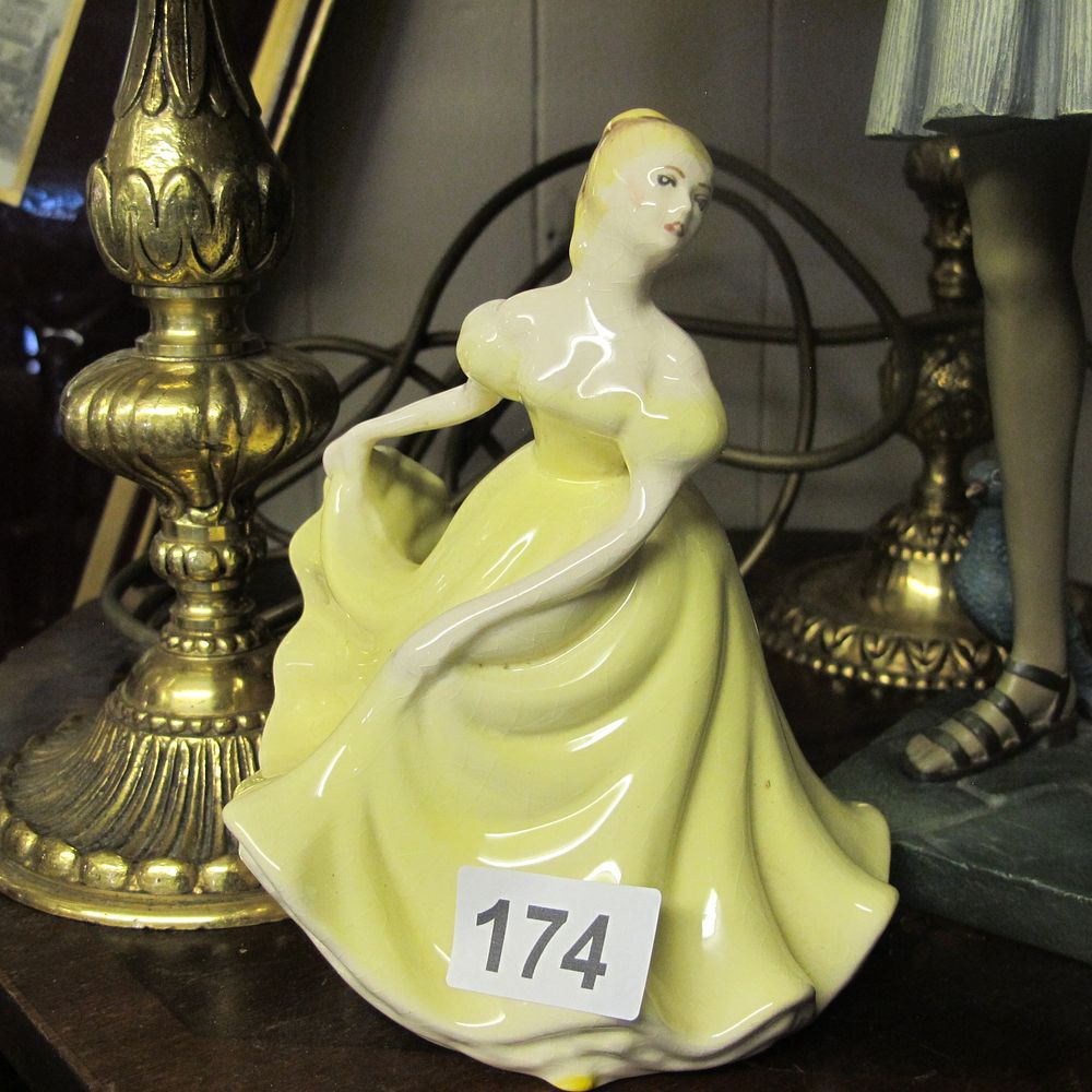 Lot 174: Ceramic figurine ***