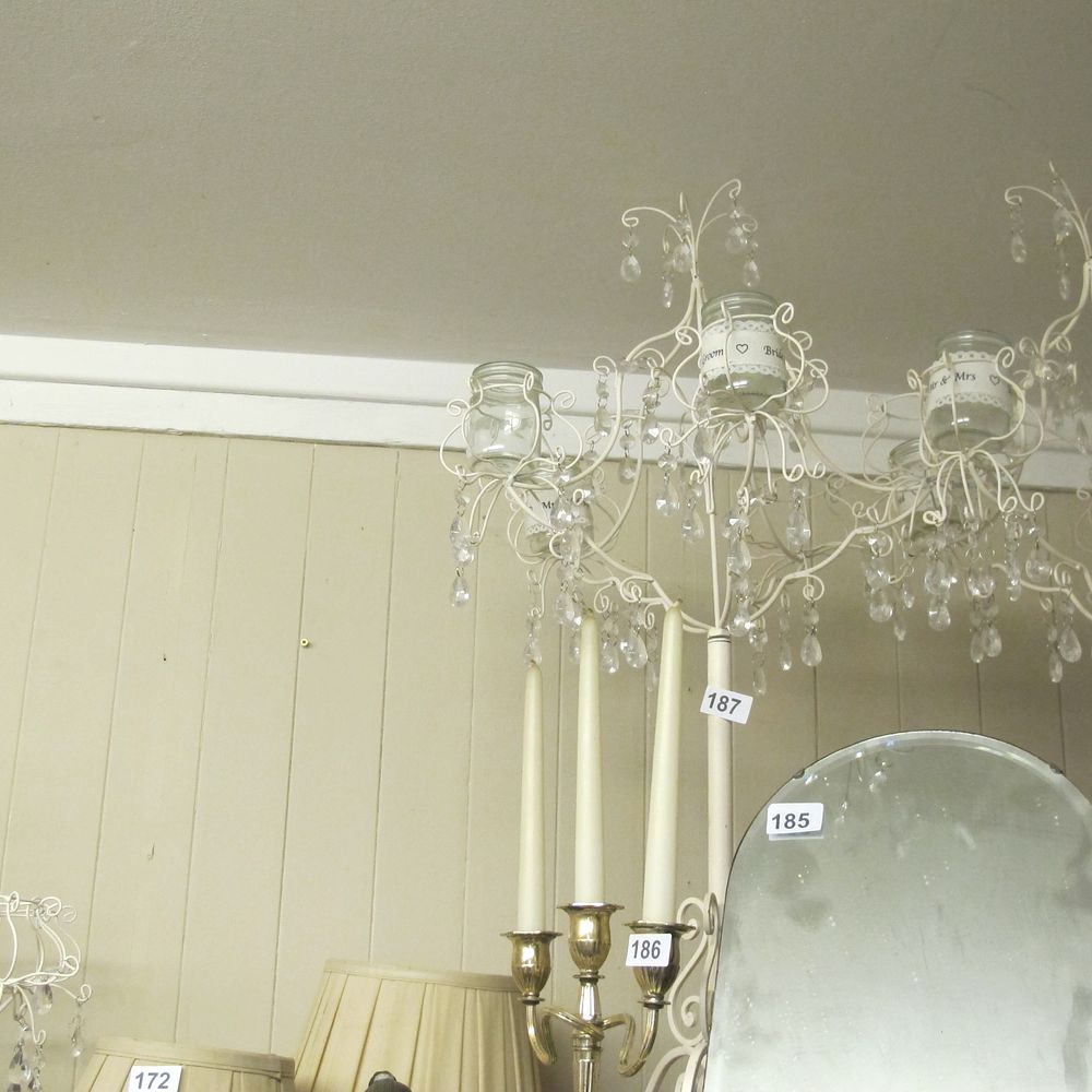 Lot 187: Ornate candle stand 
