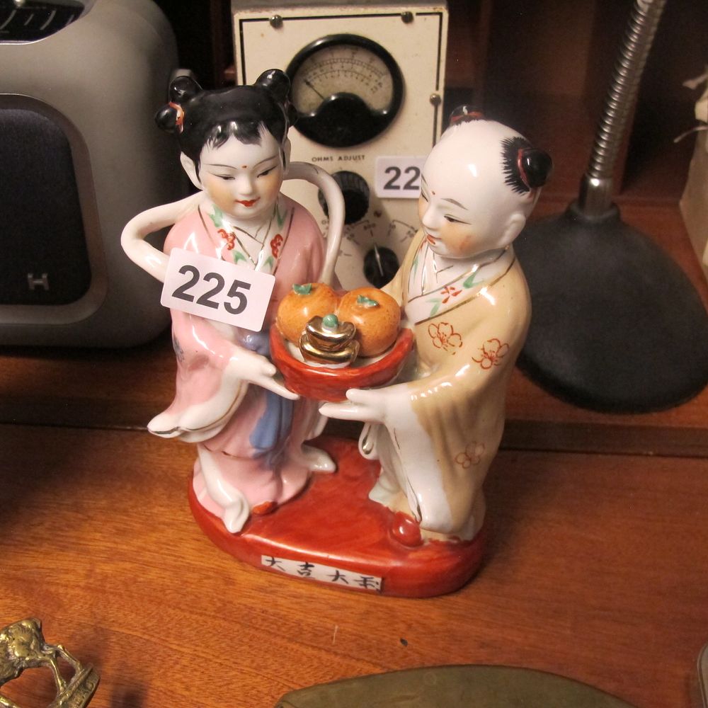 Lot 225: Oriental ceramic figurines 