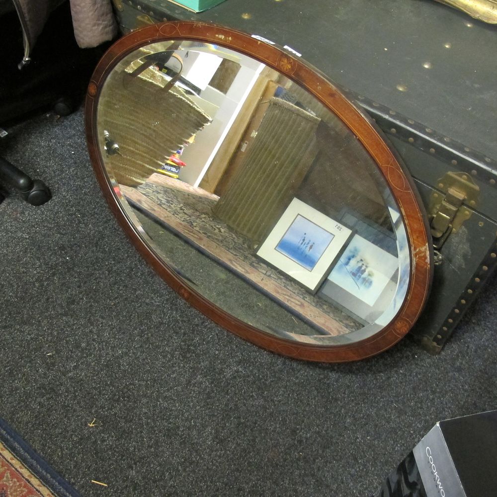 Lot 262: Wooden bevel edged mirror 
