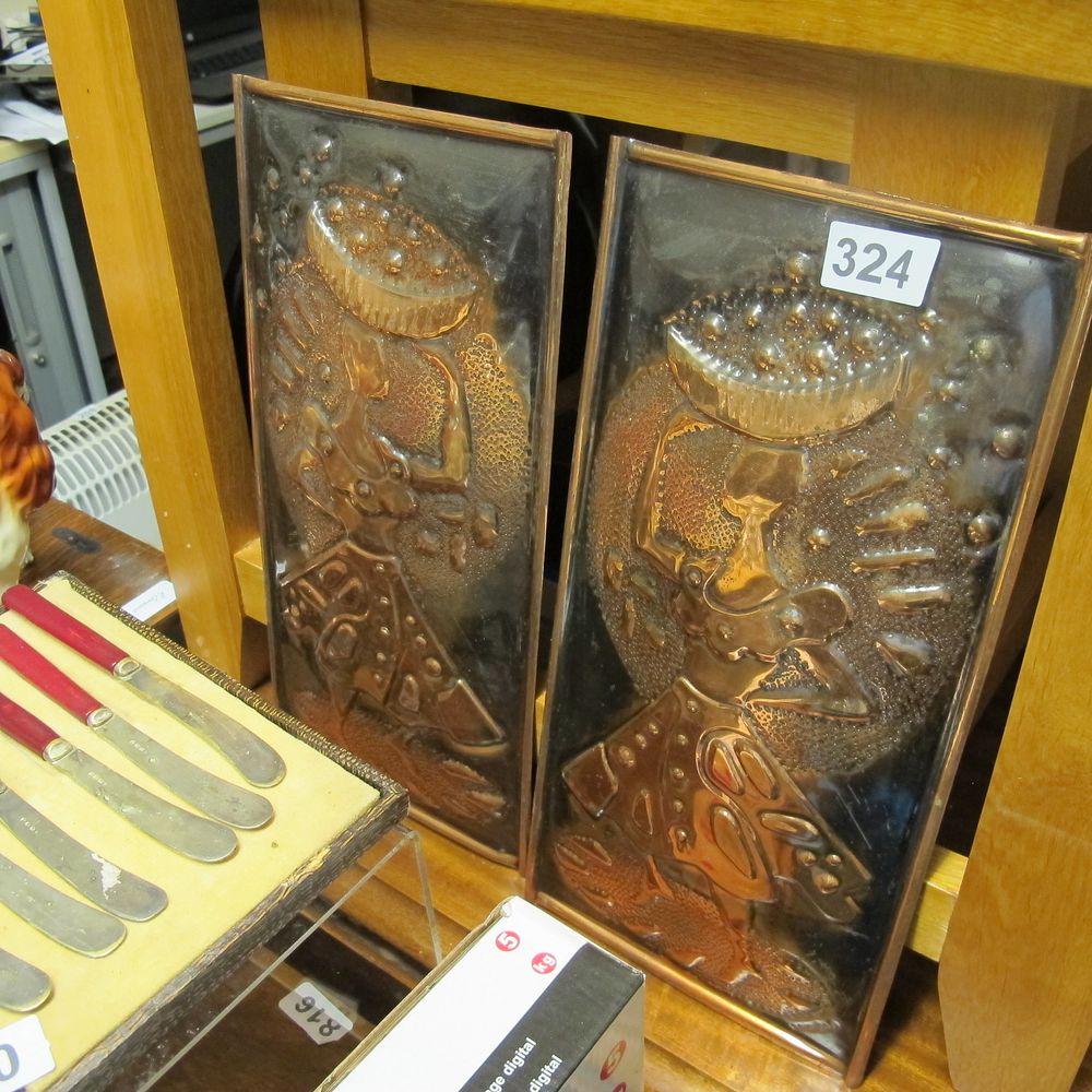 Lot 324: Pair of relief brass plaques 