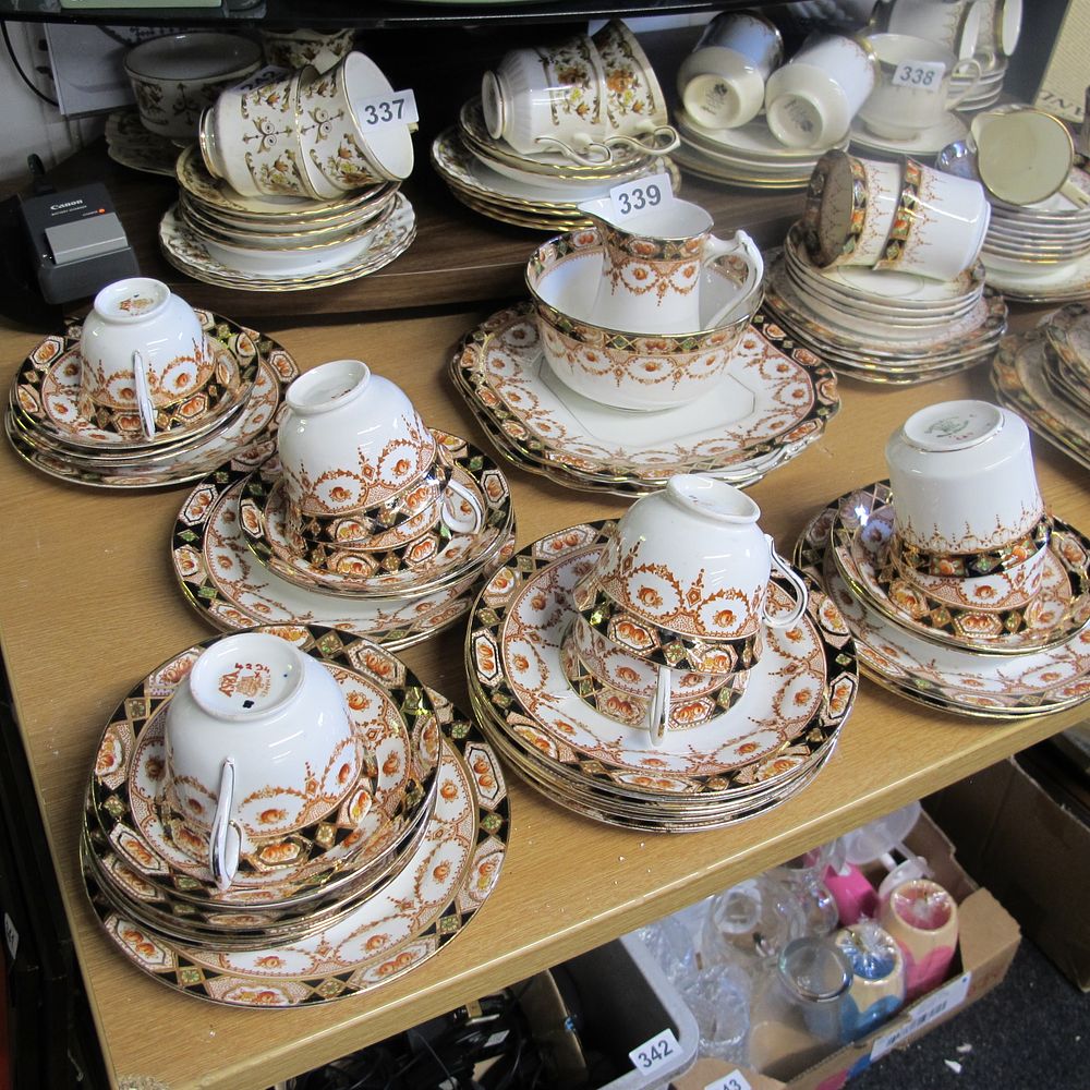 Lot 339: China teacup trios, cake dishes, milk jug and...