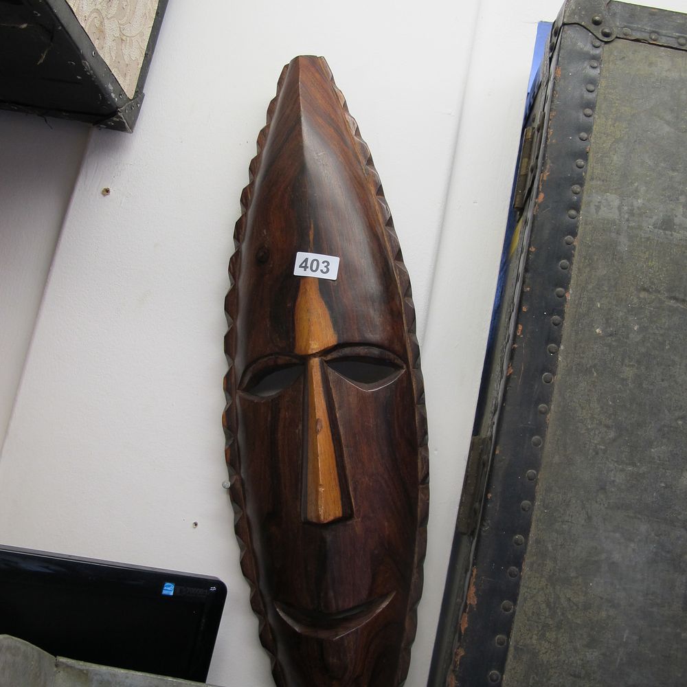 Lot 403: Carved wooden wall hanging mask 
