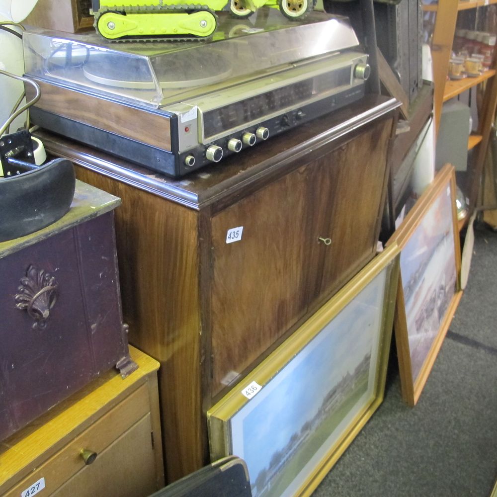 Lot 435: Wooden unit with key 