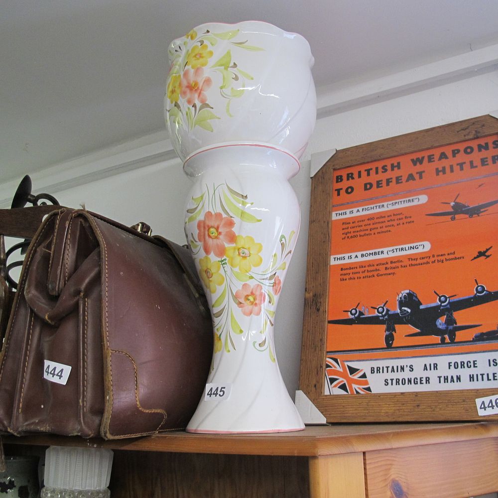 Lot 445: Ceramic pot and matching stand 