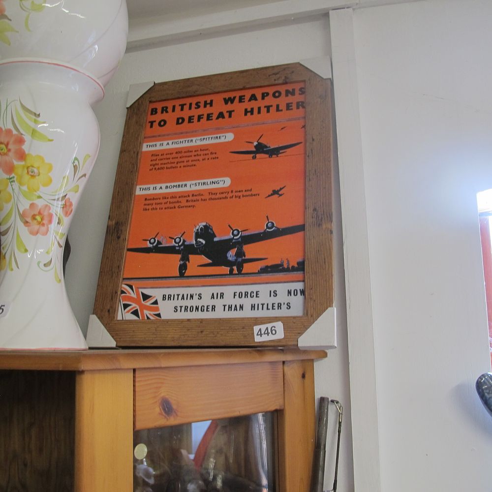Lot 446: Wood framed print of British Weapons to Defeat...