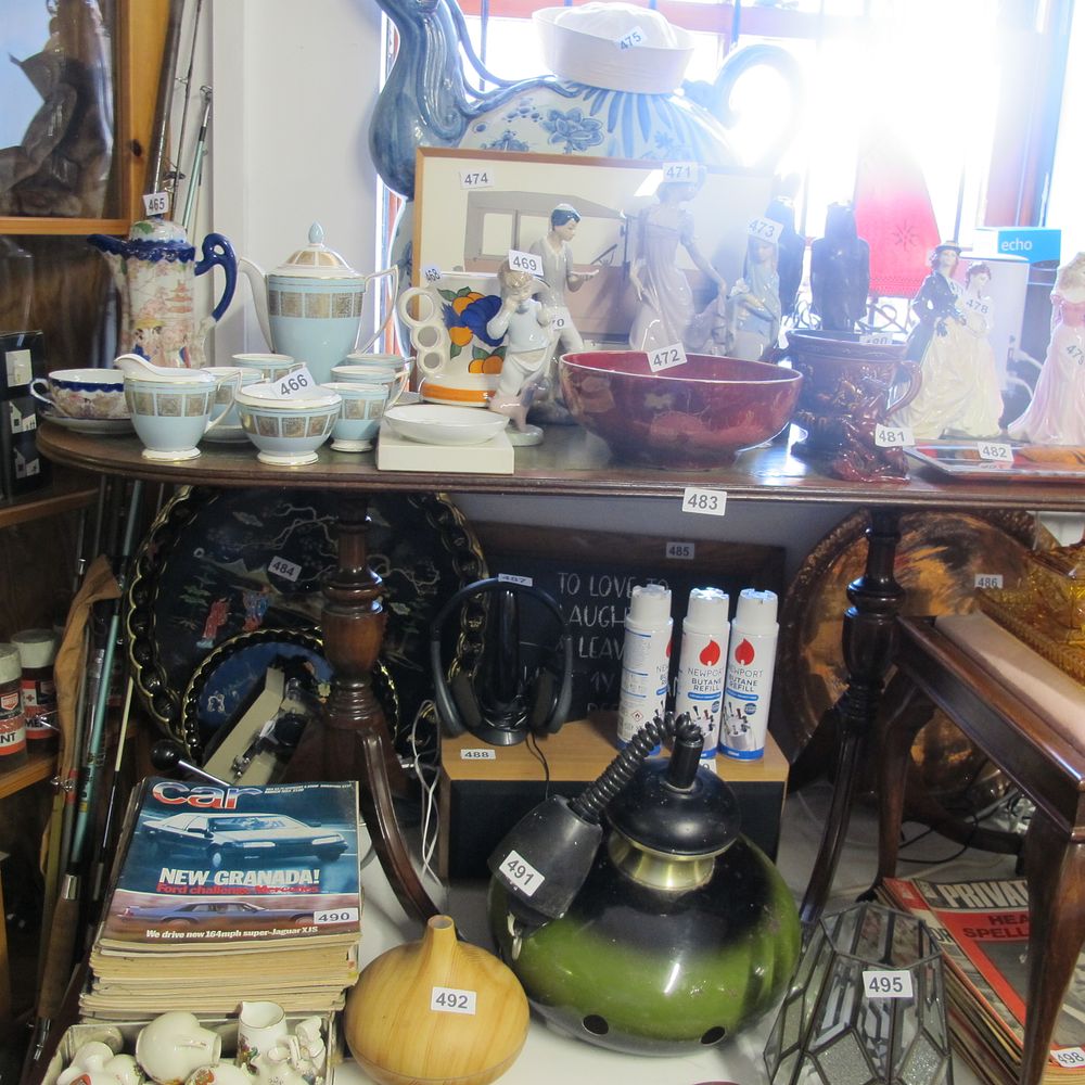 Lot 483: Wooden leather top table