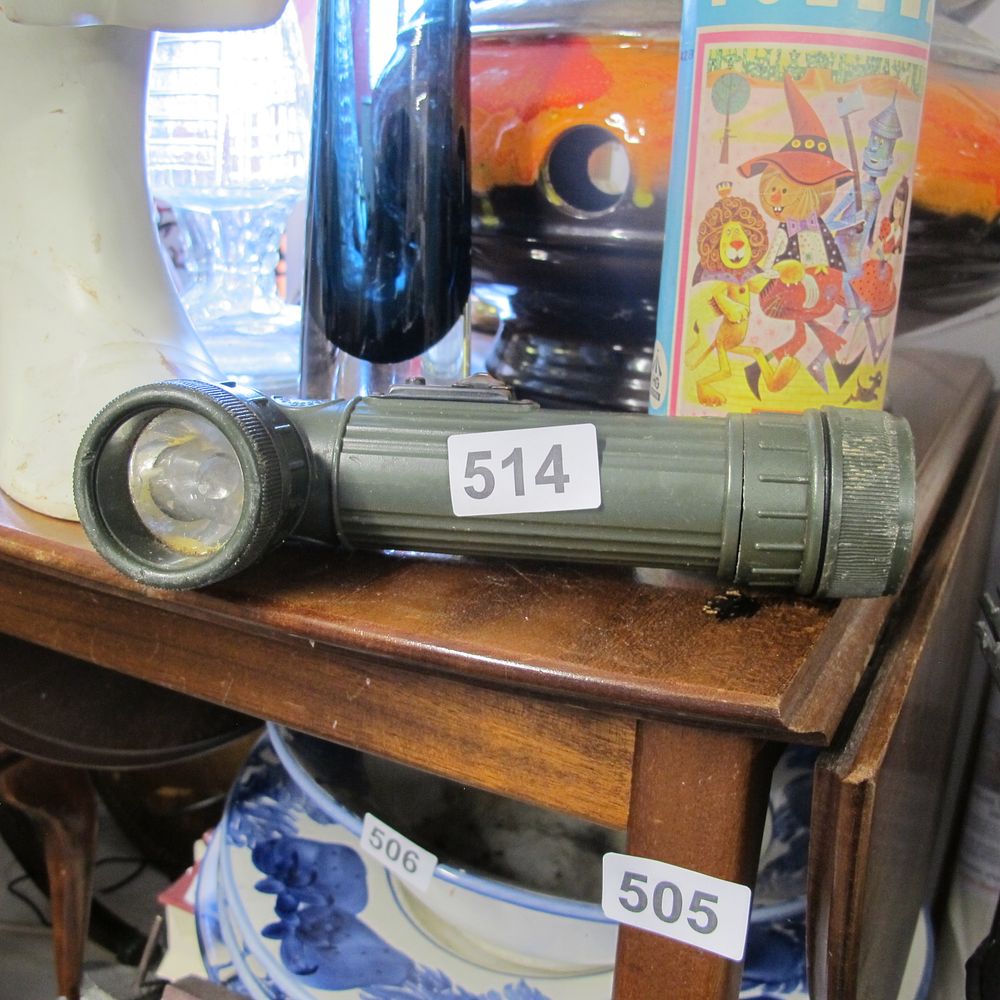 Lot 514: Military torch 