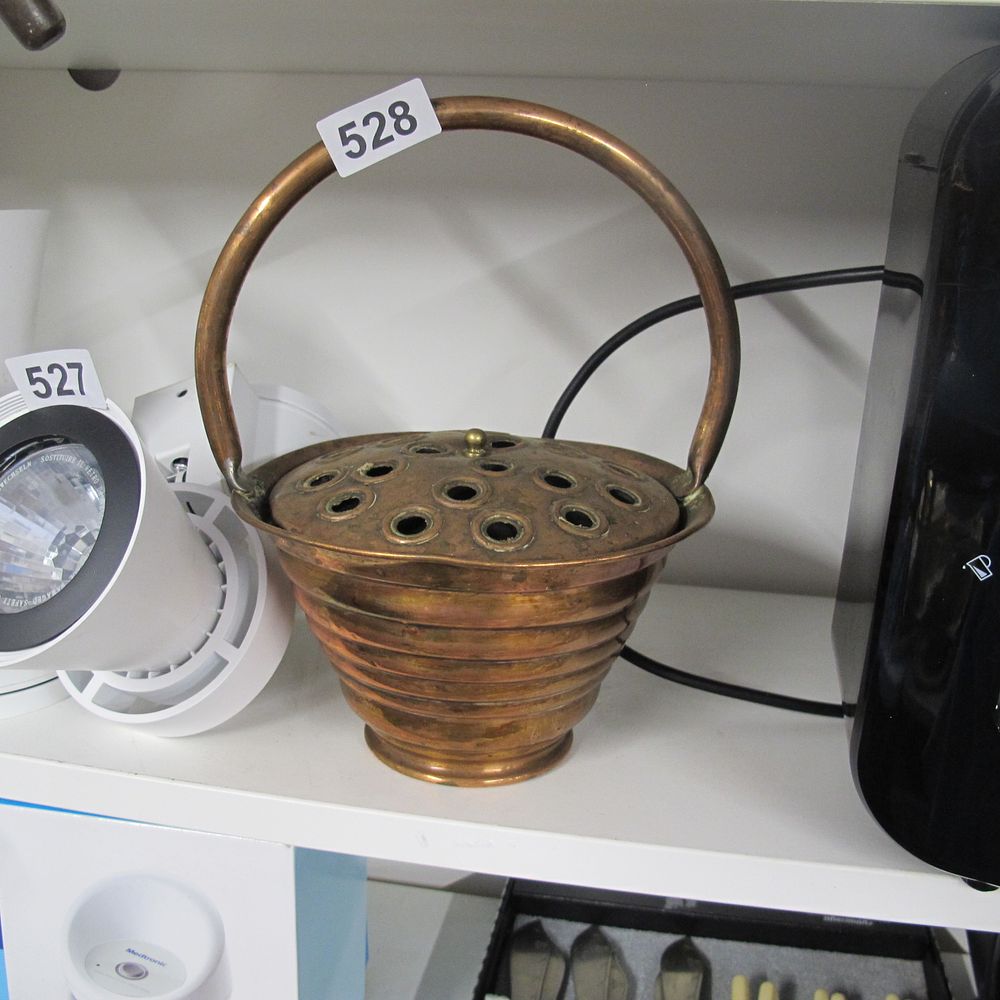 Lot 528: Copper flower pot with handle 