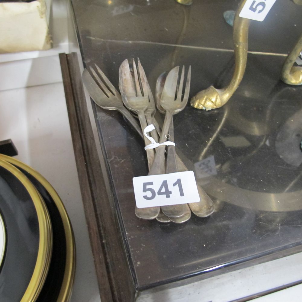 Lot 541: Stamped silver cake forks 