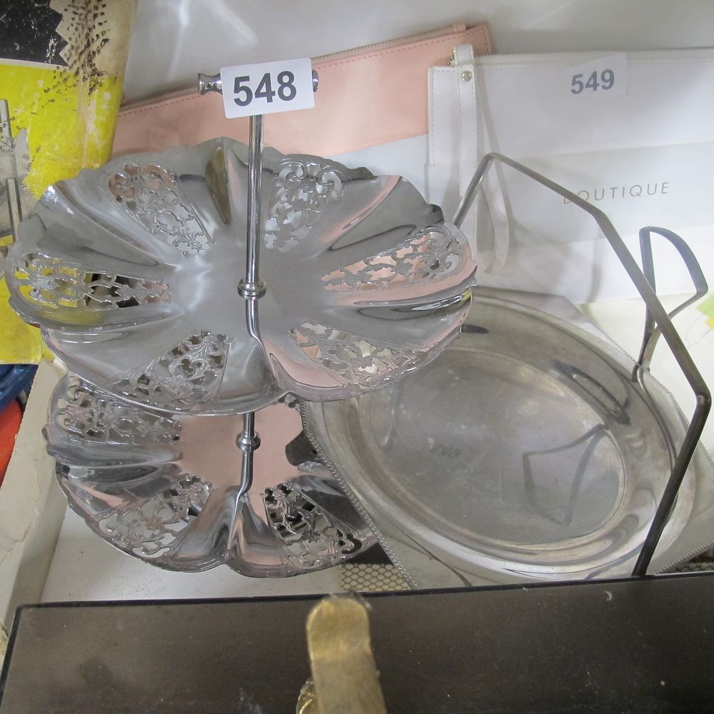 Lot 548: Ornate stand and platter with handle 