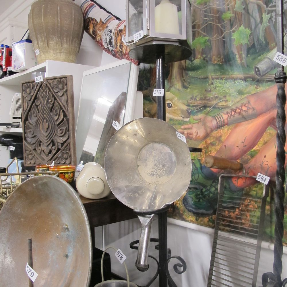 Lot 576: Tall metal  candle stand 