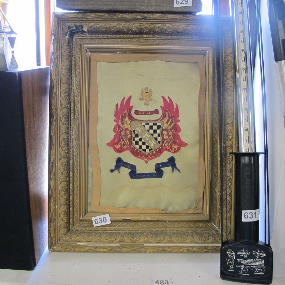 Lot 630: Gilt framed sewn coat of arms