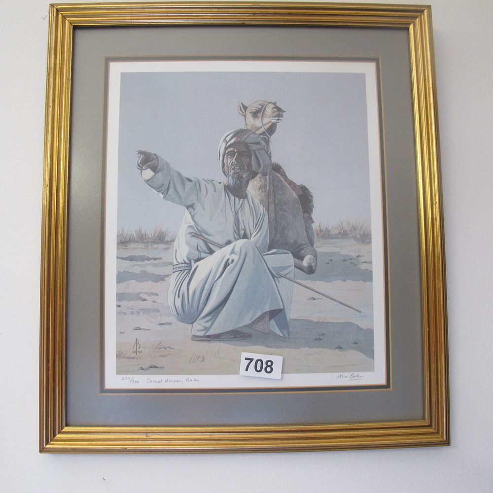Lot 708: framed and glazed print of man with camel