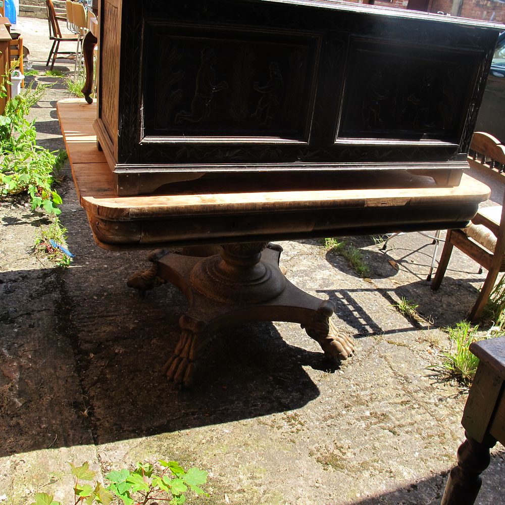 Lot 746: large solid dining table with clawed feet