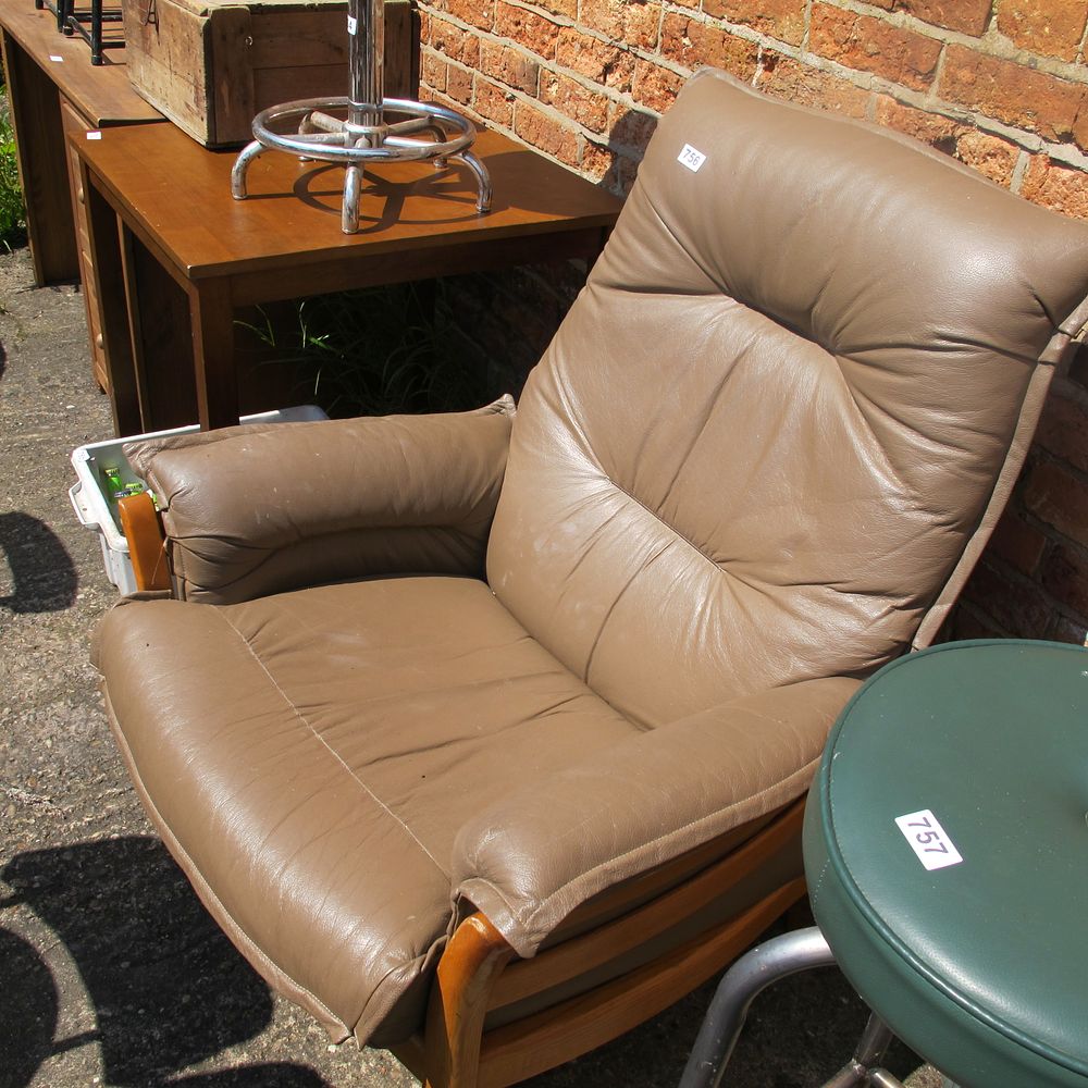 Lot 756: leather and wood arm chair