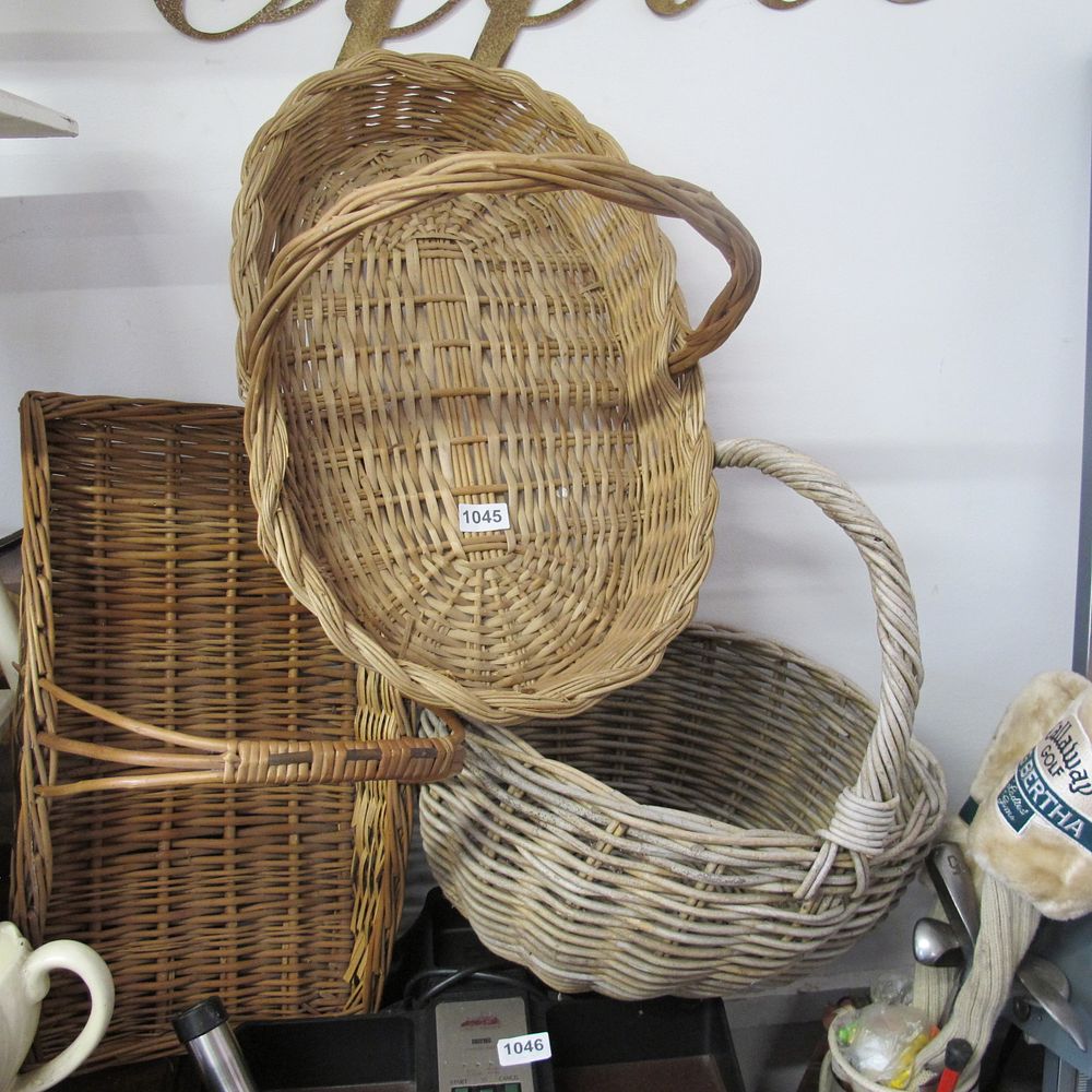 Lot 1045: Three woven wicker flower baskets 