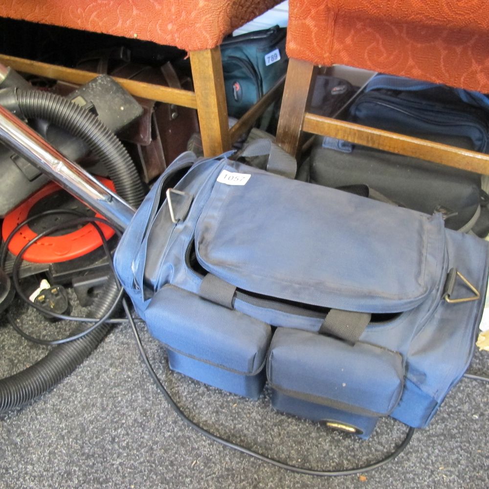 Lot 1057: various camera holdalls