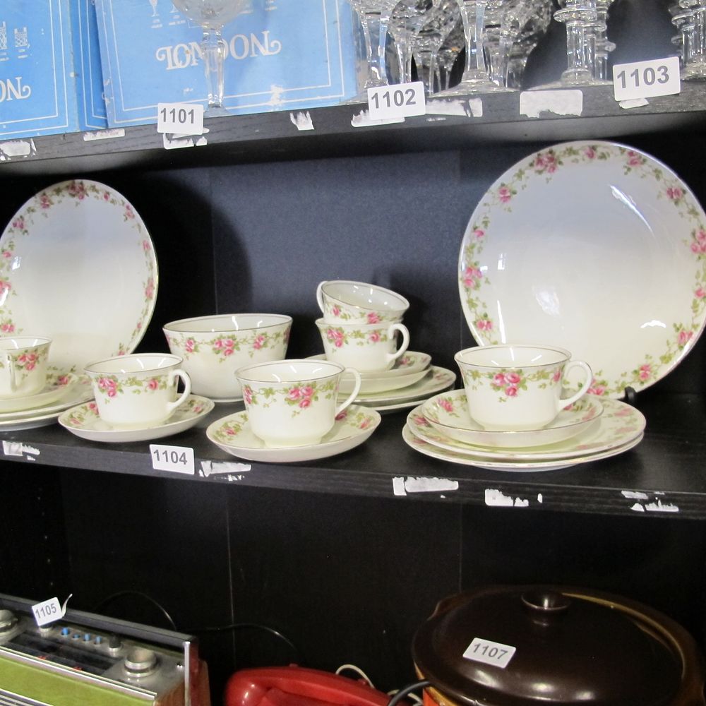 Lot 1104: Rose design Aynsley teacup trios, dishes and bowl 